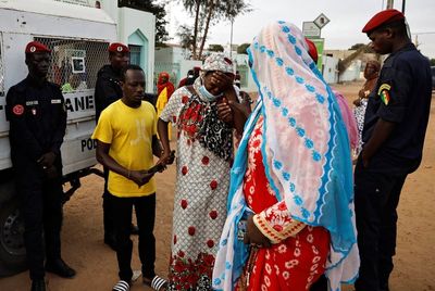 Senegal’s president calls for three days of mourning after 11 babies die in fire