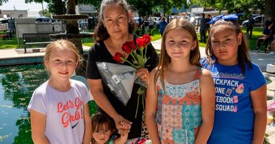 Heartbroken grandma counts out 21 red roses for victims of Texas school shooting