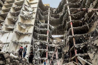 Building collapse death toll in southwest Iran rises to 24