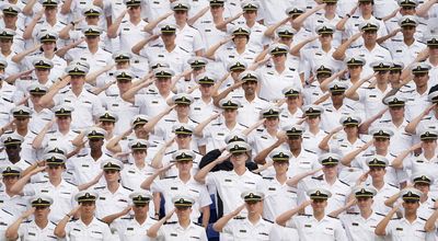 Keep the South China Sea free, Biden tells Navy graduates