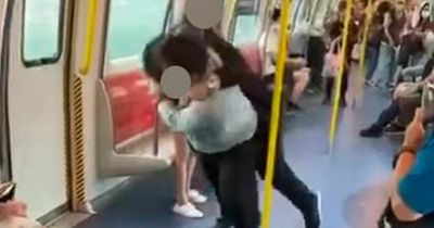 Moment two men brawl in MMA-style fight on packed train shocking passengers