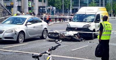 Woman in 'serious condition' following motorcycle and pedestrian crash