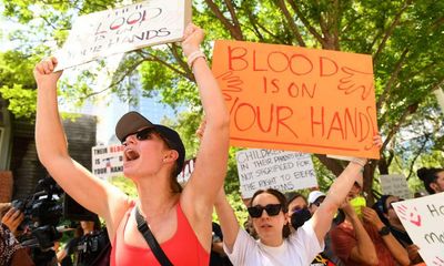 ‘I have no children left’: protesters take on NRA convention after Texas shooting