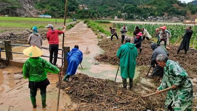 Torrential rains in China kill 15 people as floodwaters sweep away children from families