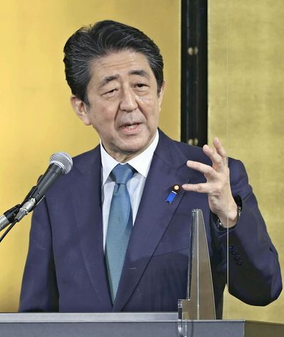 Outspoken ex-PM Abe touts own fiscal, security policies