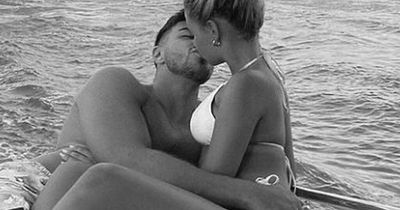 Bikini-clad Molly-Mae Hague and beau Tommy Fury smooch in loved-up boat snap in Dubai