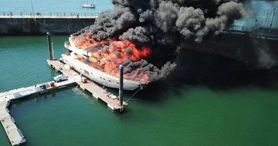 Fire on £6million superyacht as 'major incident' declared at marina