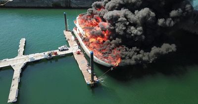 Luxury 85ft superyacht sinks after blaze in marina