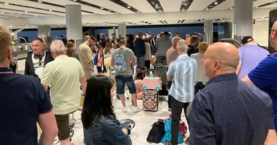 'Hundreds' of TUI passengers told by TEXT their holiday is cancelled after 'eight-hour' Manchester Airport wait