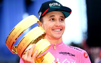 ‘Proud’ Australian Jai Hindley seals historic Giro d’Italia win with sizzling time-trial ride