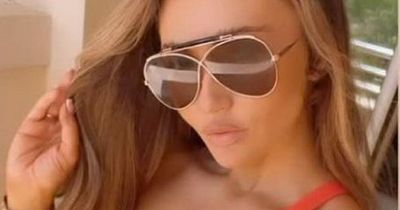 Charlotte Dawson looks sensational on holiday after 'nightmare' journey from Manchester Airport