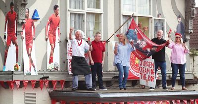 Cherry picker, parade proposal and people on roof of Toby Carvery as city celebrates LFC