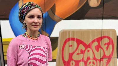 Russian artist Viktoria Veisbrut painted a vision of peace while visiting Brisbane