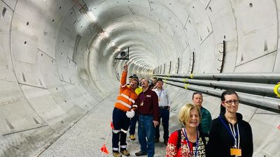 Cross River Rail's Merle tunnel welcomes walking tour group before track is laid