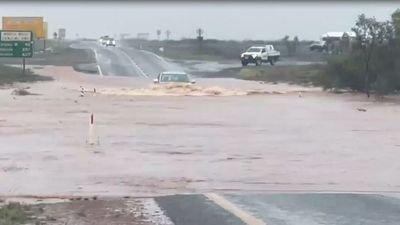 Pilbara rain records tumble as unseasonal weather floods Northwest Coastal Highway again