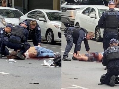 Probe into cop shooting after knife attack