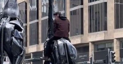 Man caught riding giant metal giraffe outside Scots entertainment centre in dangerous stunt