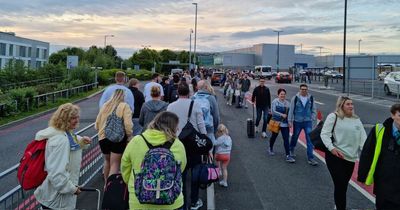 Half-term chaos as flights axed and passengers queue in street for 'zoo' airport