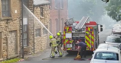Leeds suburb covered in smoke as fire rips through wool mill