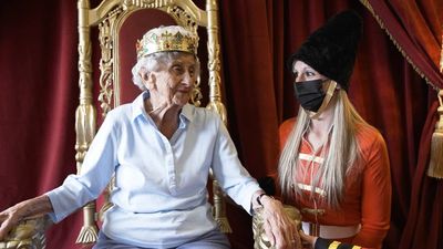 Nonagenarian crowned Queen of her care home at Platinum Jubilee party starring ‘Marcel the corgi’
