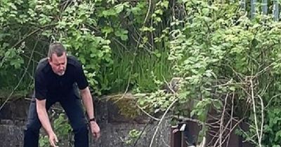 Big-hearted cop waded in to rescue stranded Canada geese sparks fierce debate over 'time wasting'