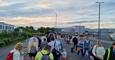 Half-term holiday hell as flights axed and queues on street for 'zoo' airport