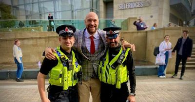 Boxing champ Tyson Fury stops for pictures with GMP officers on trip to Manchester
