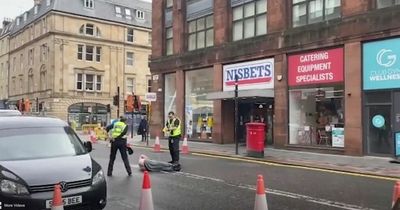 Dramatic footage shows cops stun gun topless man in Glasgow street