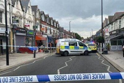 Man suffering slash injuries collapses in front of shoppers in north London
