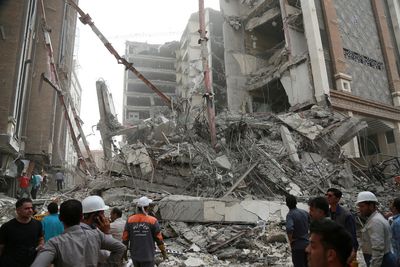 Violence mars Iran's day of mourning for building-collapse victims