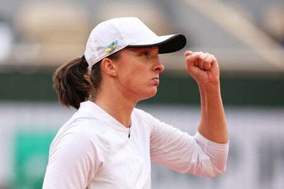 French Open: Iga Swiatek survives scare to secure 32nd consecutive win as Daniil Medvedev crashes out