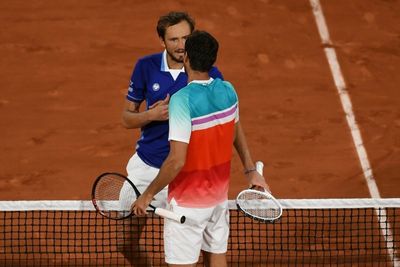 Medvedev and Tsitsipas crash at French Open as Swiatek survives scare