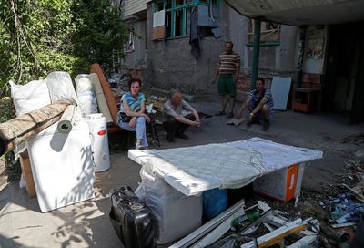 Life in Ukraine's post-siege Mariupol: barter markets and Russian TV