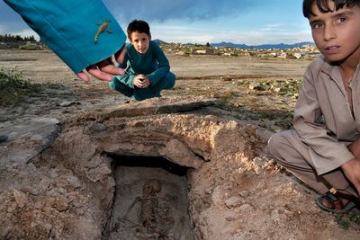 AP PHOTOS: In Kabul, cemeteries a part of Afghan daily life