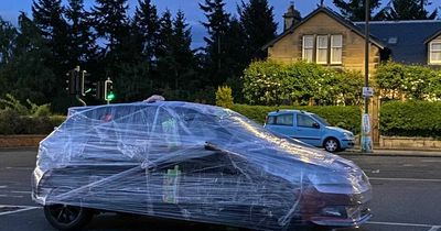 Edinburgh driver pranked as jokesters wrap entire car up in cling film