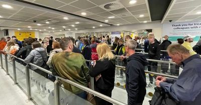 Moment police told furious Manchester Airport passengers their TUI trip is cancelled