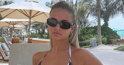 Molly-Mae Hague has a 'pinch me' moment as she reads her own book by the pool on holiday