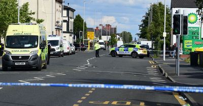 Motorbike rider and passenger left lying in busy road after hit and run