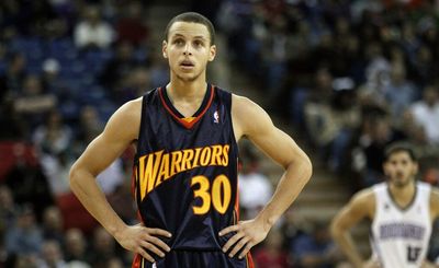 This picture of a rookie Stephen Curry and Celtics coach Ime Udoka rocks so much