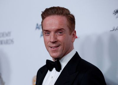 Actor Damian Lewis and former Northern Ireland leader honoured by Queen Elizabeth