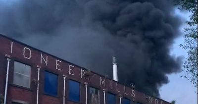 Smoke billows over Manchester as fire crews tackle huge blaze in Radcliffe