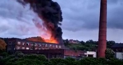 Greater Manchester fire: Plumes of black smoke billow in sky as blaze tears through mill