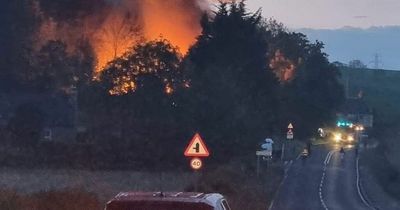 Images show huge fire which closed Scots road as emergency services rushed to scene