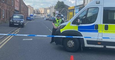 Man dead in Johnstone and woman seriously injured as police cordon off street