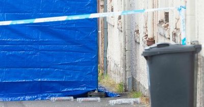Chilling images show blood splattered window at scene of suspicious death in Johnstone
