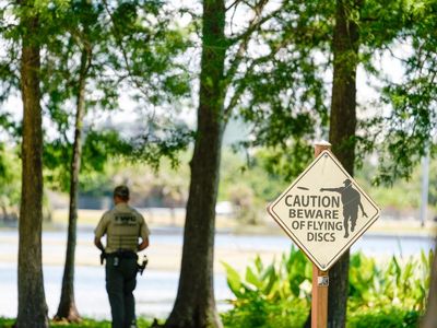 Man dies after being bitten by alligator as he looked for frisbees in Florida lake