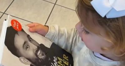 Tom Parker's daughter kisses late dad's face on book cover in tear-jerking video