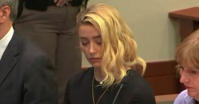 Moment 'heartbroken' Amber Heard told Johnny Depp had won $15m in bitter legal battle