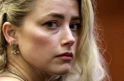 ‘Heartbroken’ Amber Heard says Johnny Depp libel trial defeat is a ‘setback’ for women