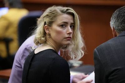 Amber Heard says the trial's verdict is "a setback" for women